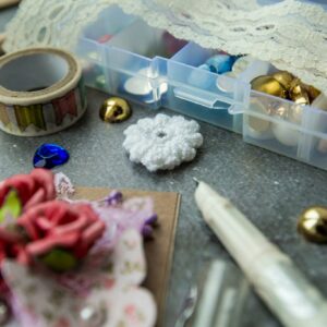 Fancy stones collection arranged on table during creation of handmade gift